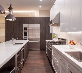 Contemporary kitchen black woodgrain laminate and white shaker door by Bellmont